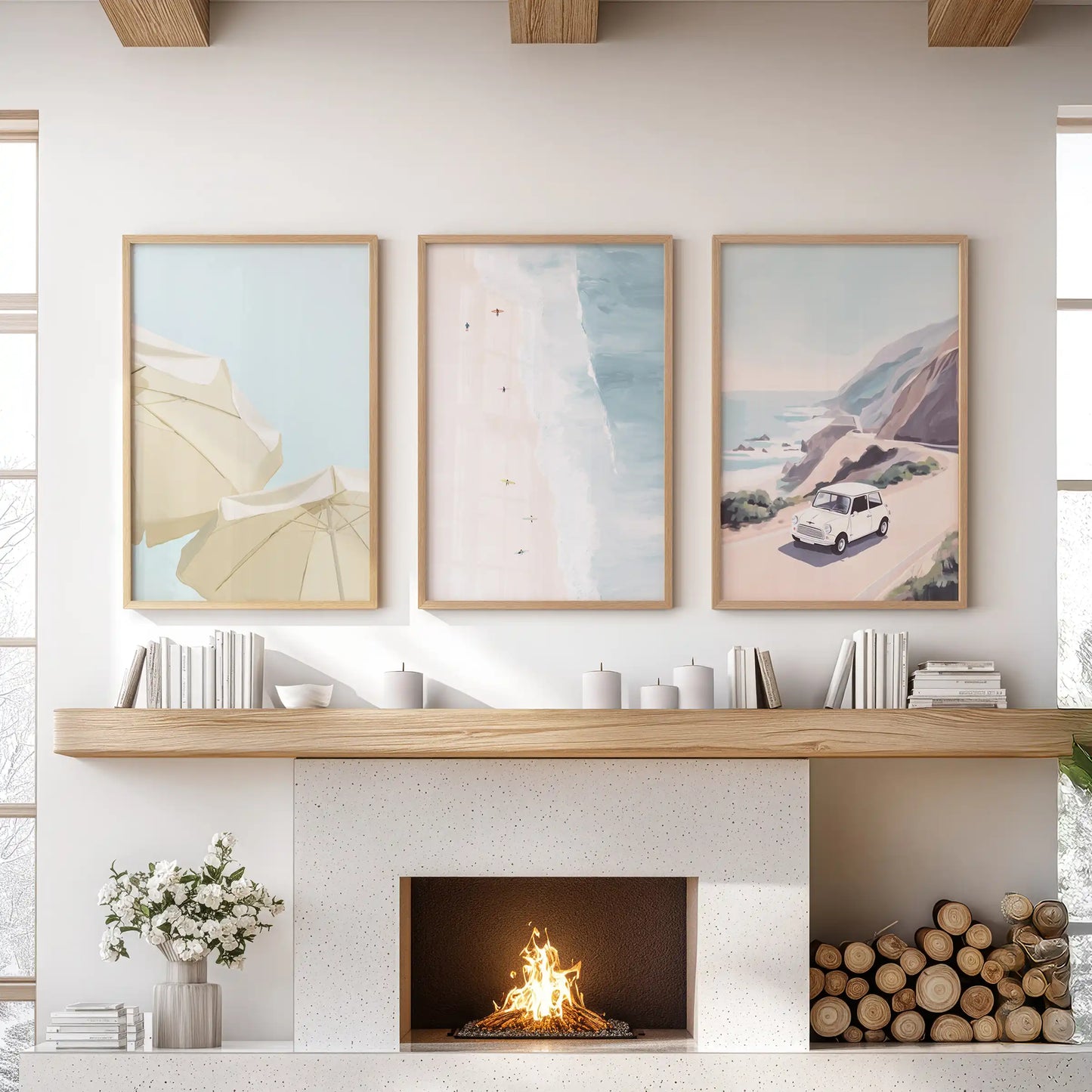 Three light-wood-framed ocean prints wash the sitting-room wall above the mantle in tide-softened color.