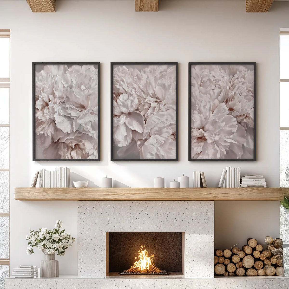 Layers of ruffled peony petals in blush, ivory and taupe fill three black-framed prints above a fireplace, with no stems visible.