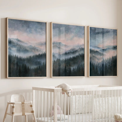 Blue watercolor landscape wall art comes as a three-piece set in solid oak frames, softly hung above the cot in the nursery.
