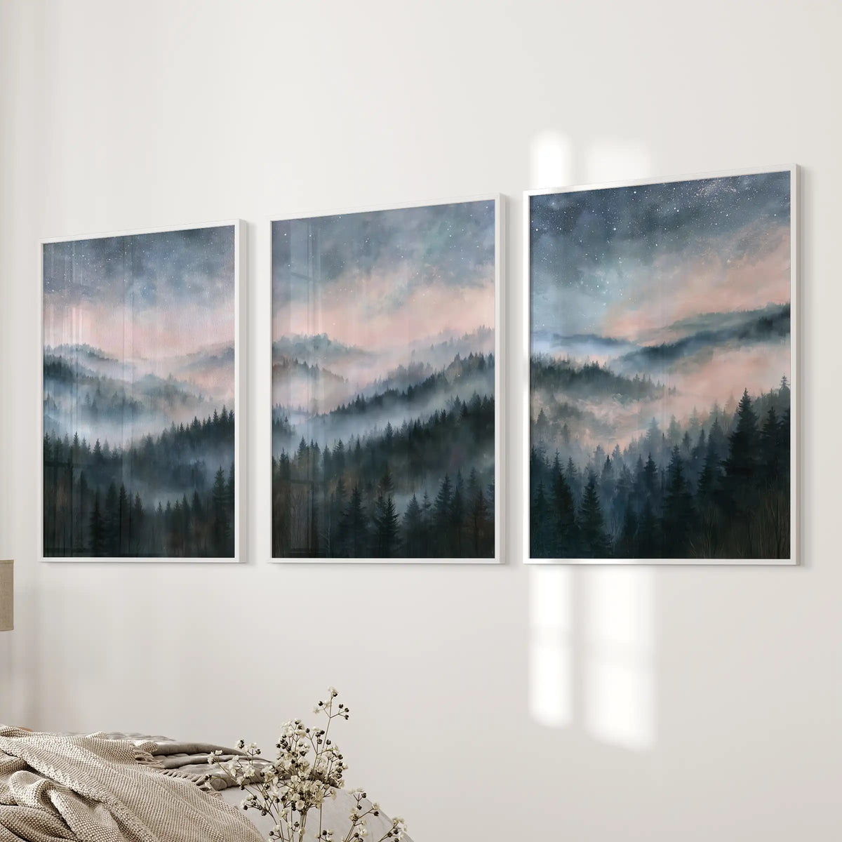 Pine woodland in fog art prints, a set of three in white frames for the bedroom, positioned beside the bed wall to soothe the space.