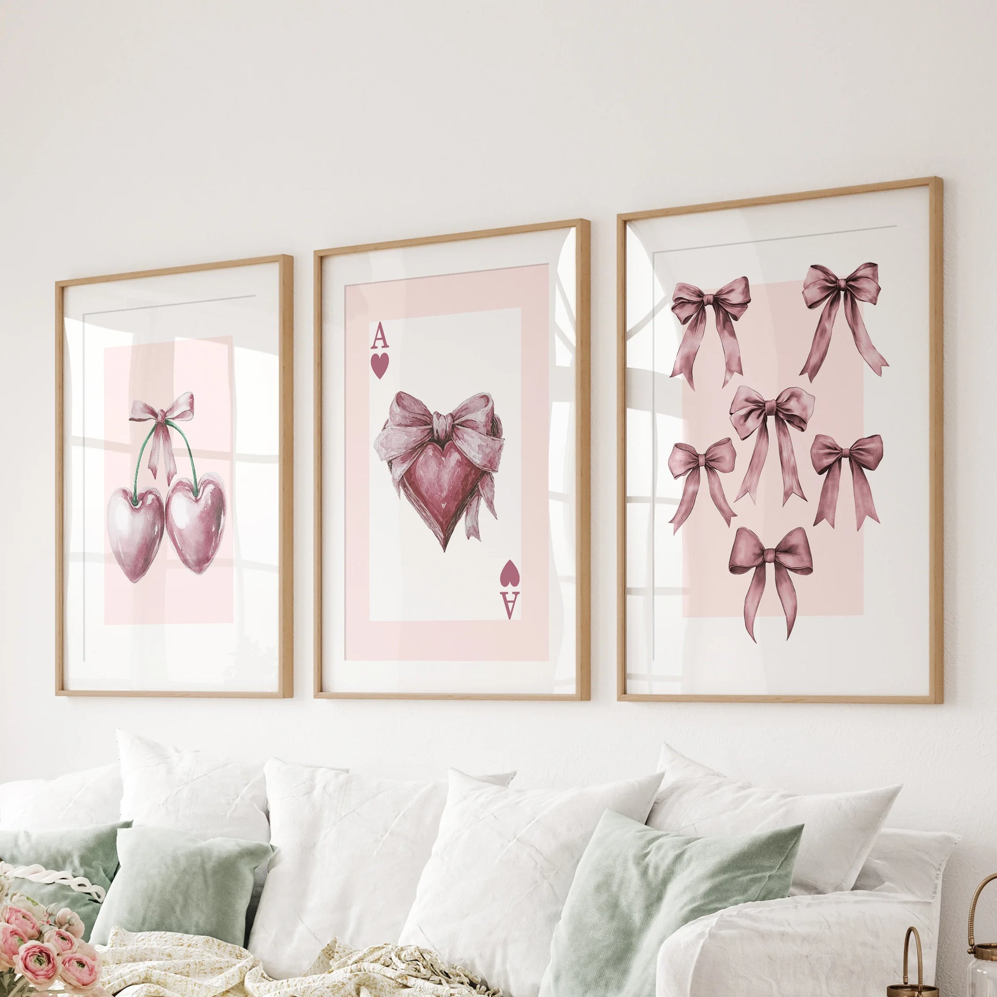 Red cherry illustrations 3-piece picture set, wood frames with matting, hangs above the sectional sofa in the family room for a crisp, playful accent.
