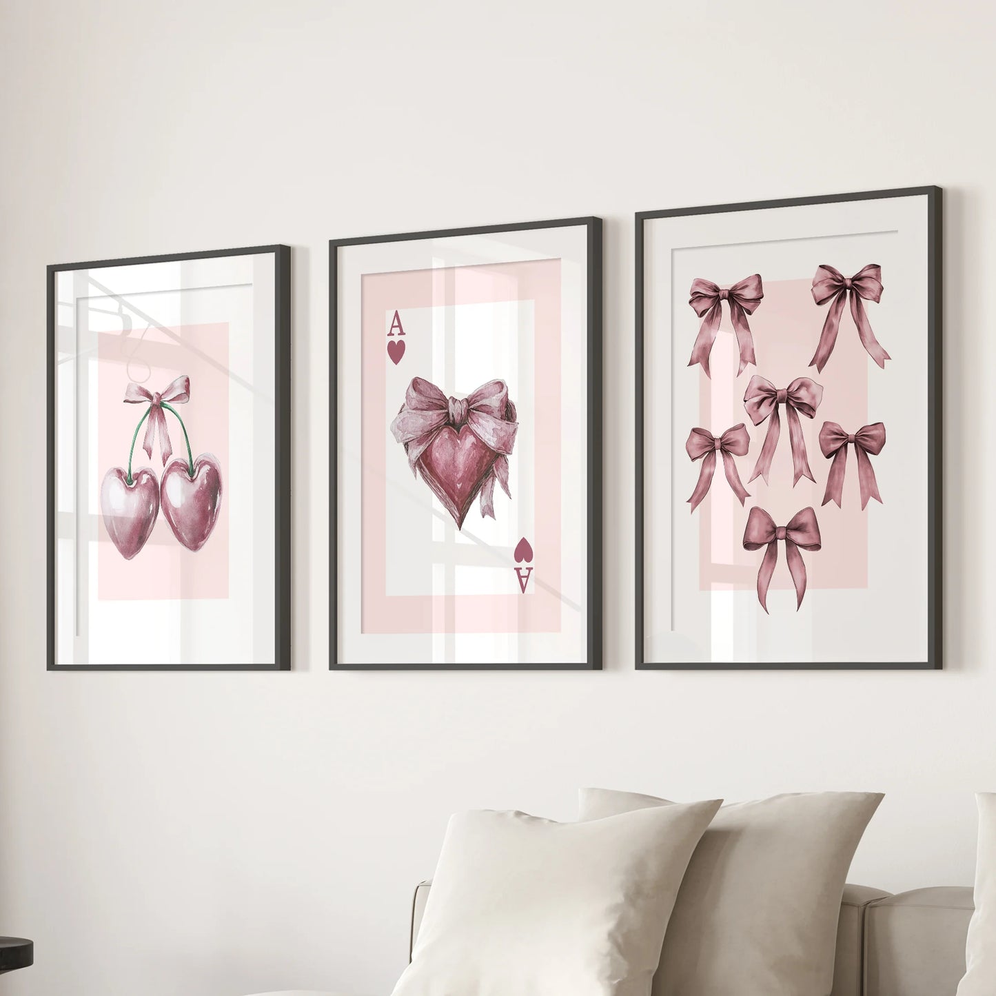 Three black-matted wall prints of red cherries line the sitting room over the sectional, adding a crisp, preppy pop of color to the space.