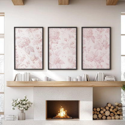 Pink roses and hydrangeas fill three black-framed prints above a fireplace.
