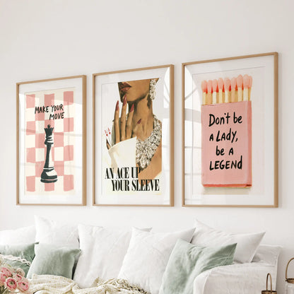 Pink glamour wall art set of three in matted wood frames, arranged above a sectional in the sitting room.