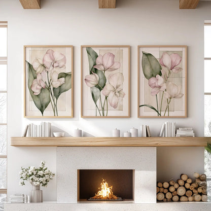 Oak frames display three pink flower prints above a fireplace.