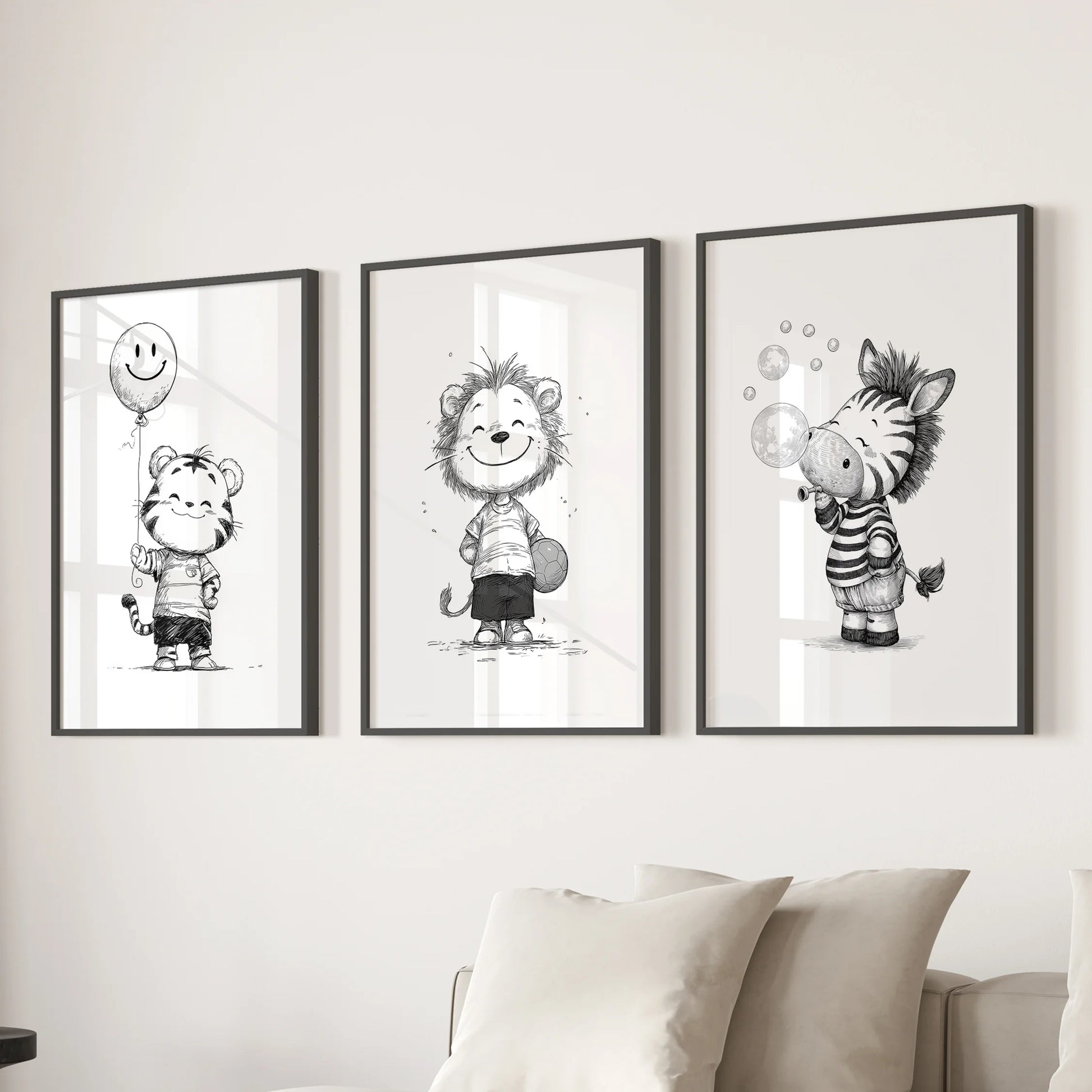 Lion, tiger, and zebra portraits, 3-print wall art in black frames, arranged over the living room sectional for a crisp, neutral safari accent.