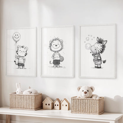 A 3-print wall art set of black-and-white safari animals in white frames adds cheerful personality to the playroom’s wall decor.