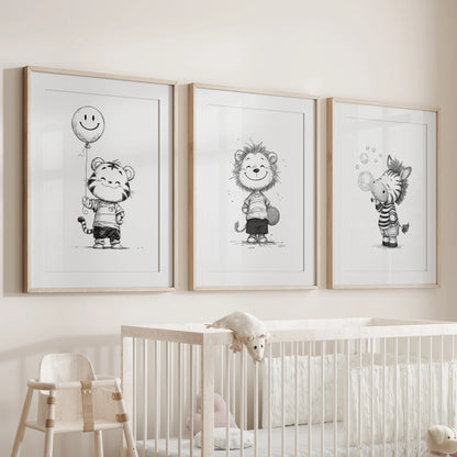 Lion, tiger, and zebra portraits, a set of 3 wall prints in light oak frames with mats, arranged above the crib as a calm nursery focal point.