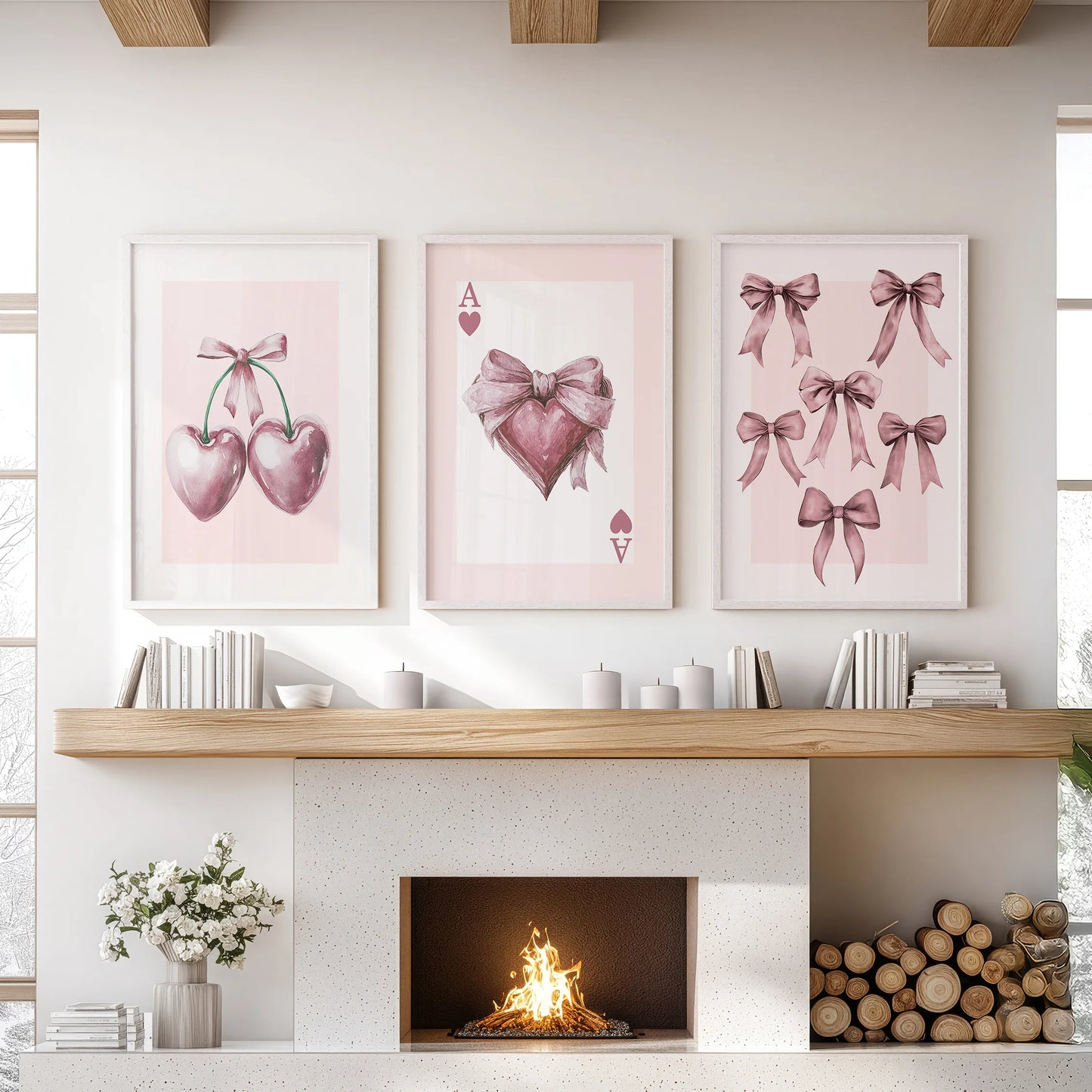 Red cherries three-piece artwork in white framed prints perches above the mantel in the living room, fresh and graphic against a pale wall.
