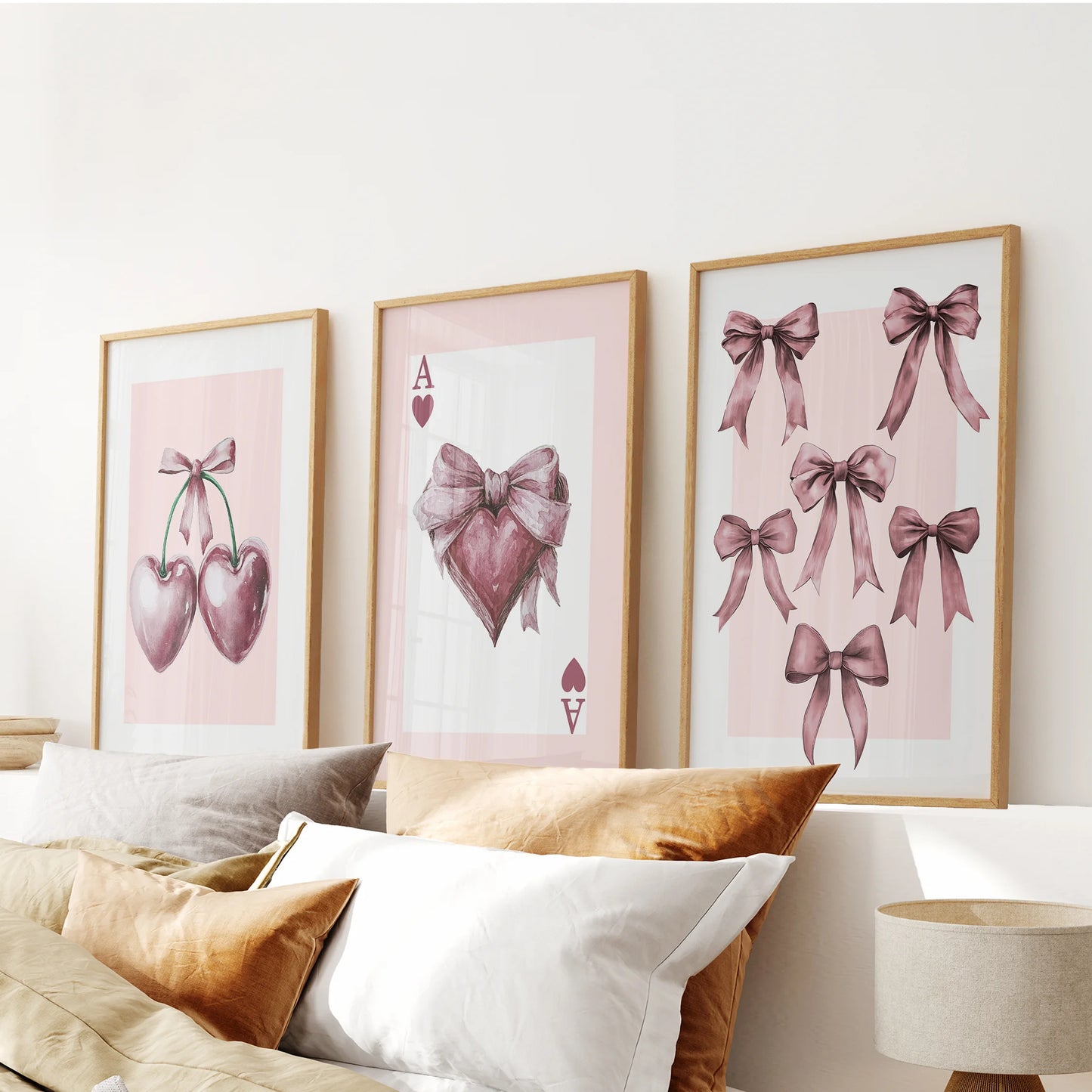 Ace of Hearts card trio 3-piece framed art set in warm oak frames centers above the bed headboard, giving the bedroom a cheeky, tailored note.