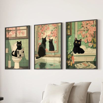 Vintage Japanese cat bathroom poster triptych, set of three, in black framed prints hung over the sectional in the lounge.