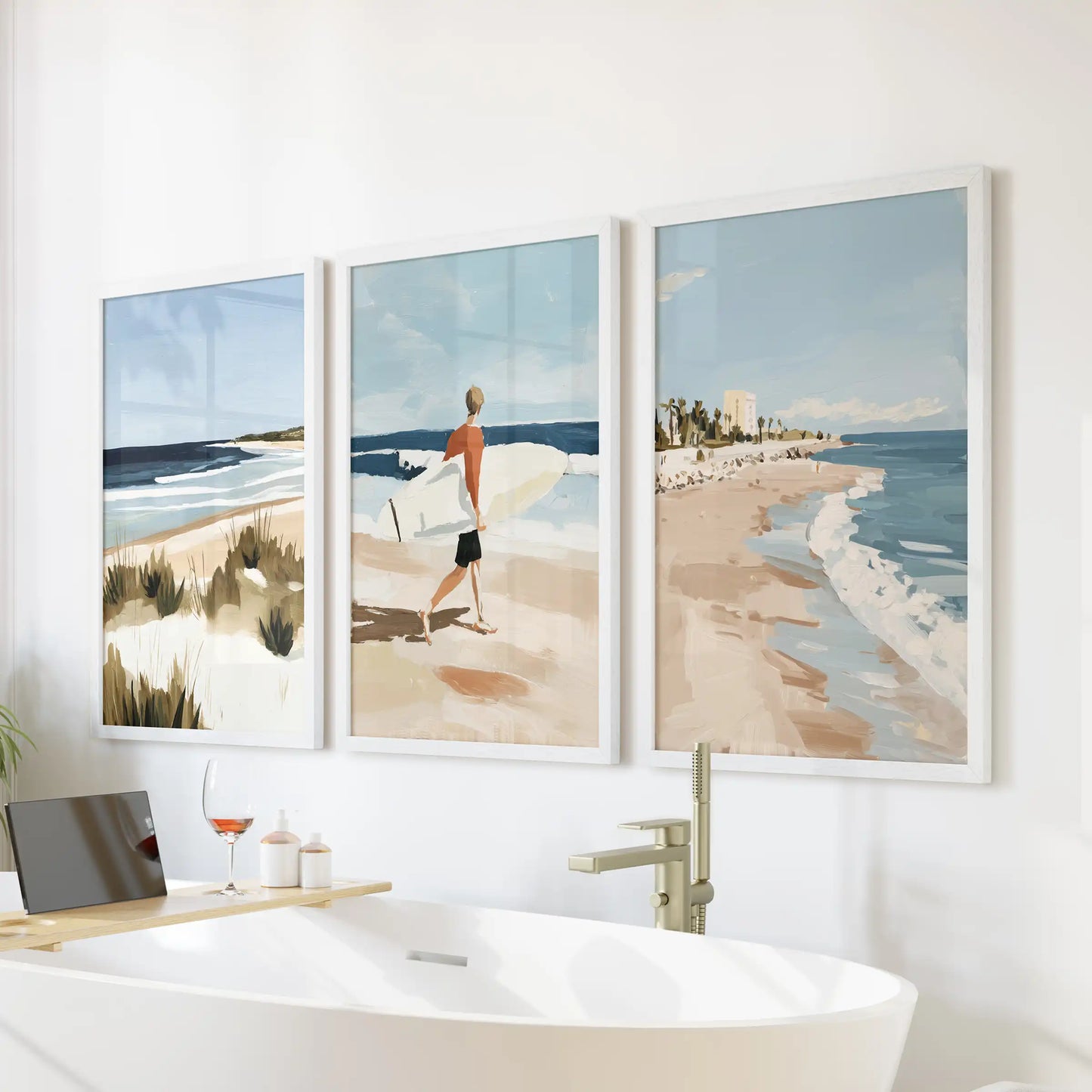 This 3-piece wall art set of ocean waves in white frames rests above the tub, lending the bathroom a light, spa-like calm.