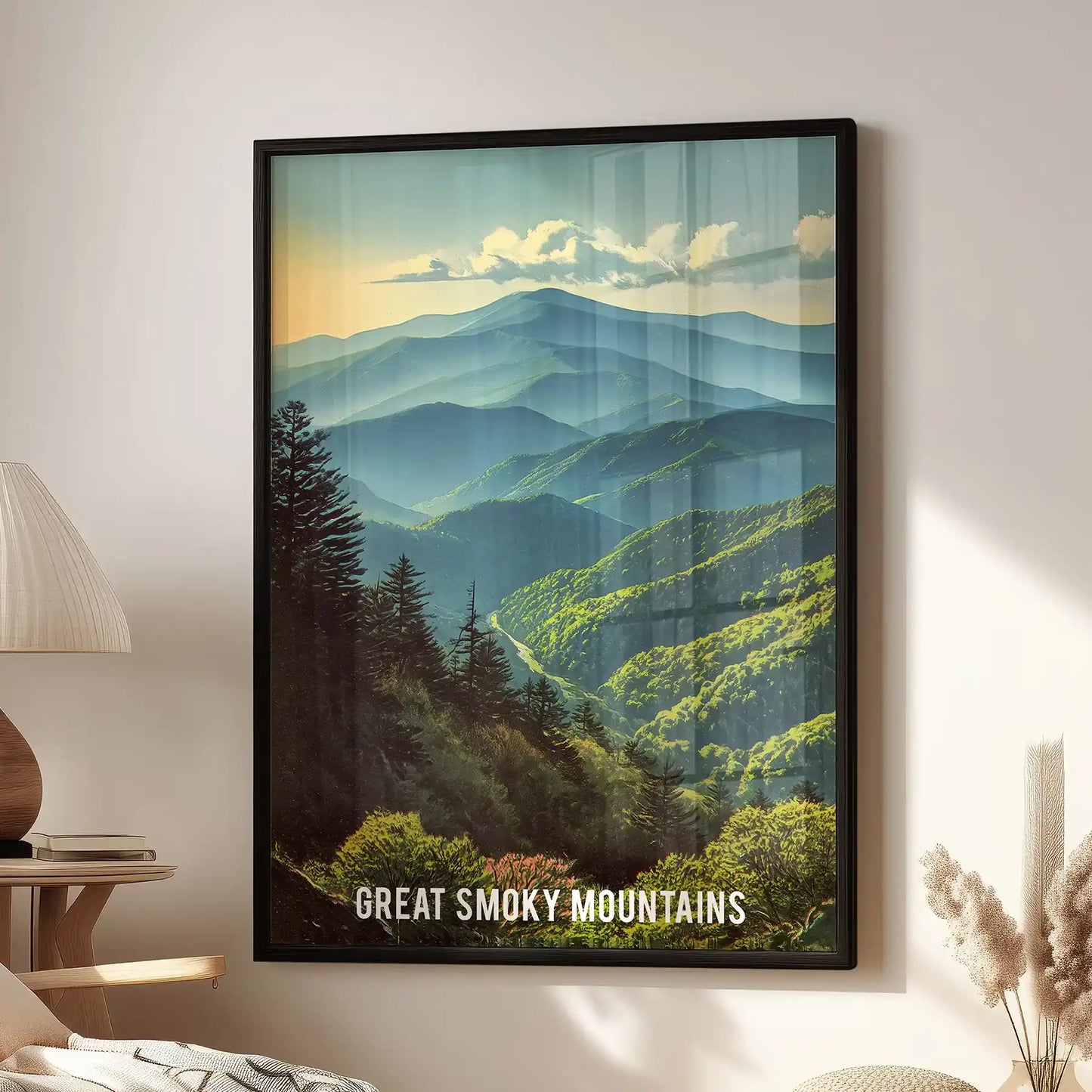 Framed wall art of the Great Smoky Mountains in a black frame sits beside a reading chair, adding a calm touch to the family room.