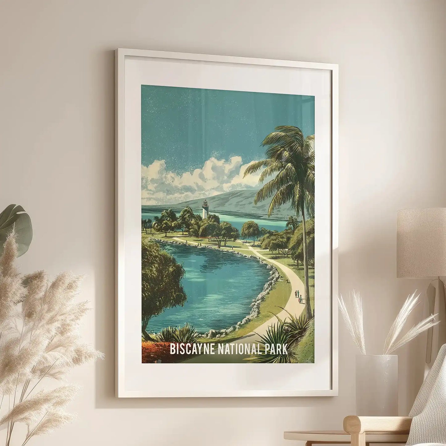 Vintage tropical waterscape gallery wall art print, matted and white-framed, anchors the family room over an armchair with a sunny Biscayne Bay vibe.