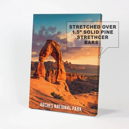 Wrapped canvas wall decor featuring Delicate Arch introduces gallery texture and sharp edges, energizing a clean accent wall.