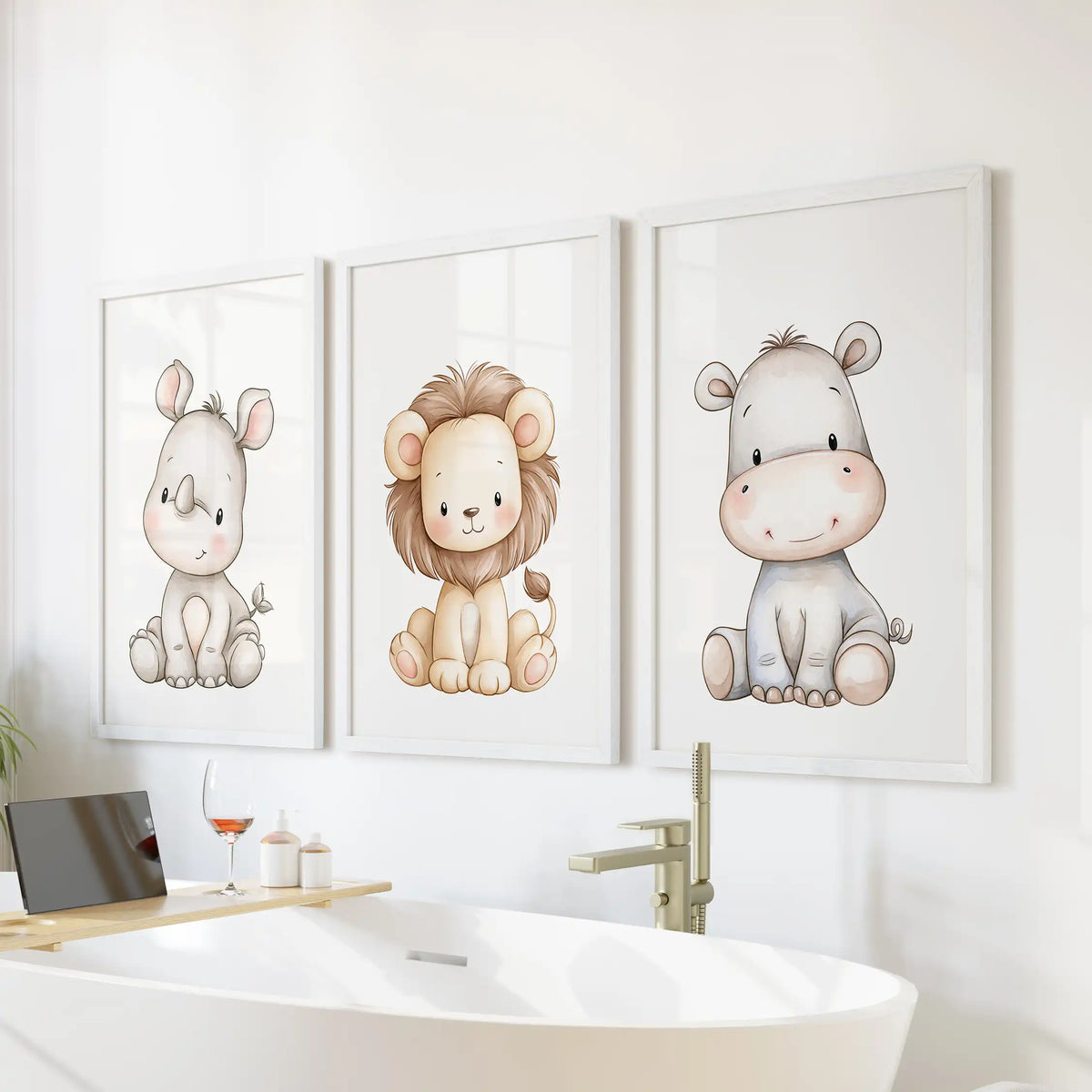 Three rhino, lion and hippo prints in white frames above a freestanding bathtub.