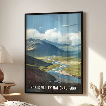 A single-panel wall art piece of a forest and river valley rests in a black frame above the family room lounge seat, adding calm, northern balance.
