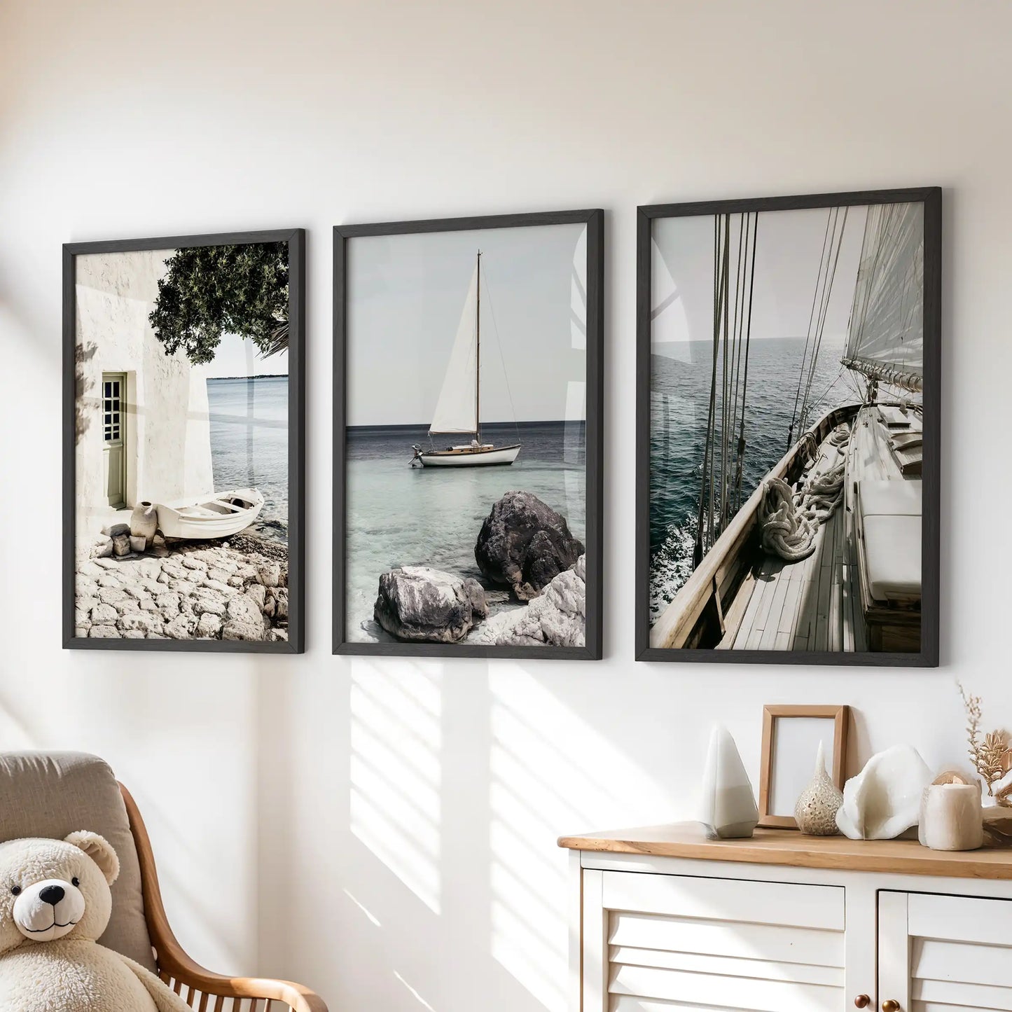Sunlit marina harbor prints, 3 print wall art set, sit neatly over the dresser in the kids playroom, with slim black frames to add polish without clutter.