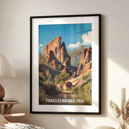 A black-matted framed print illustrating desert canyon formations hangs above a lounge seat, adding texture and depth to a family room setting.