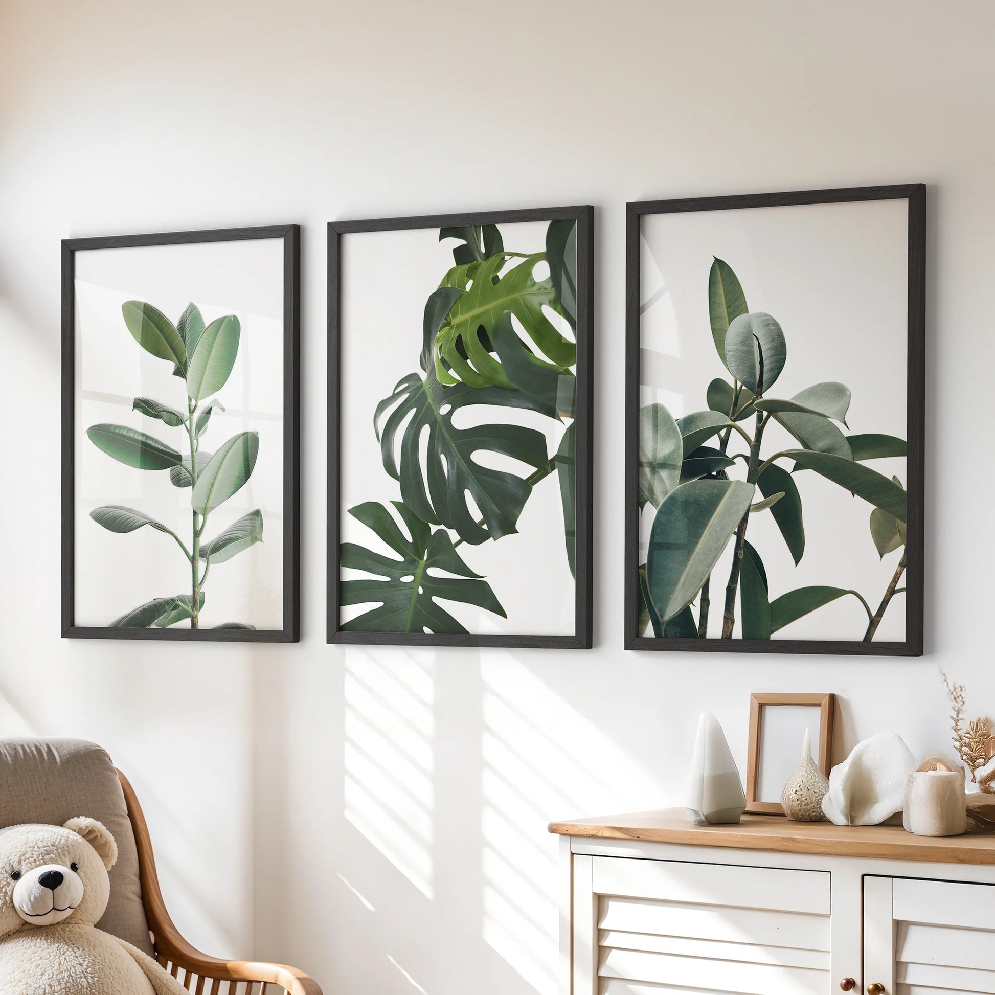 Lively tropical close-up prints, framed in black and grouped as a set of 3, add a bright splash above the playroom drawers.