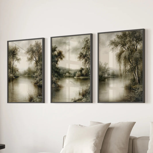 Rustic countryside landscape, a set of three black-framed wall art prints, hangs over a sectional sofa in the lounge.