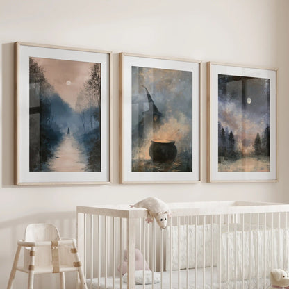 Dark cottagecore woods art prints, a three-piece wall set in thin wood frames with mats, hang gently above the bassinet in a cozy baby room.