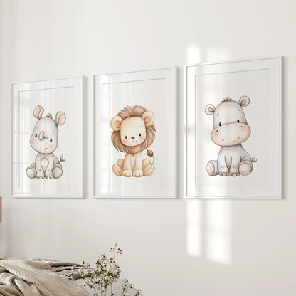 White mats surround seated rhino, lion and hippo illustrations in three white-framed prints beside a bed.