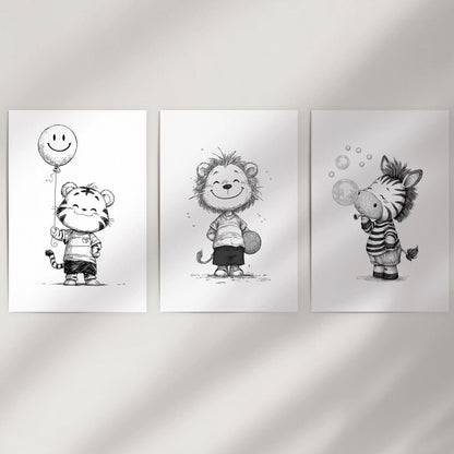 A soft 3-piece gallery wall of unmounted baby animal prints rests on a neutral wall, creating a calm, minimalist look for a nursery or gentle space.