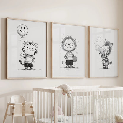 A 3-piece baby animal wall decor set in oak frames hangs above the crib, giving the infant room gentle, nature-inspired charm.