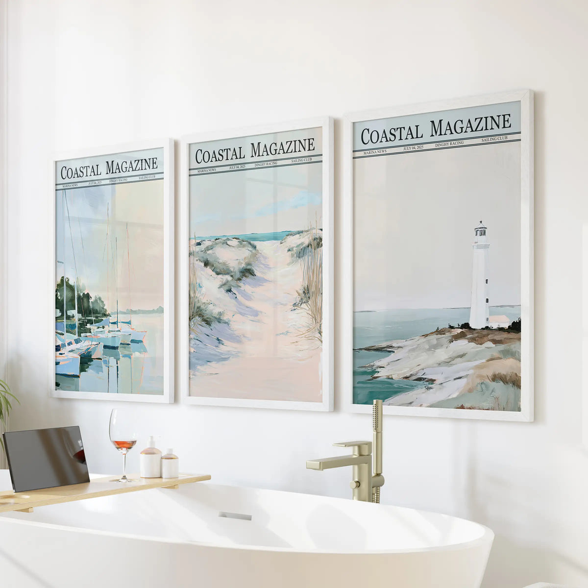 Sailboat marina set of three wall decor prints in white frames, displayed on a bathroom wall above the bathtub with dune and lighthouse views.