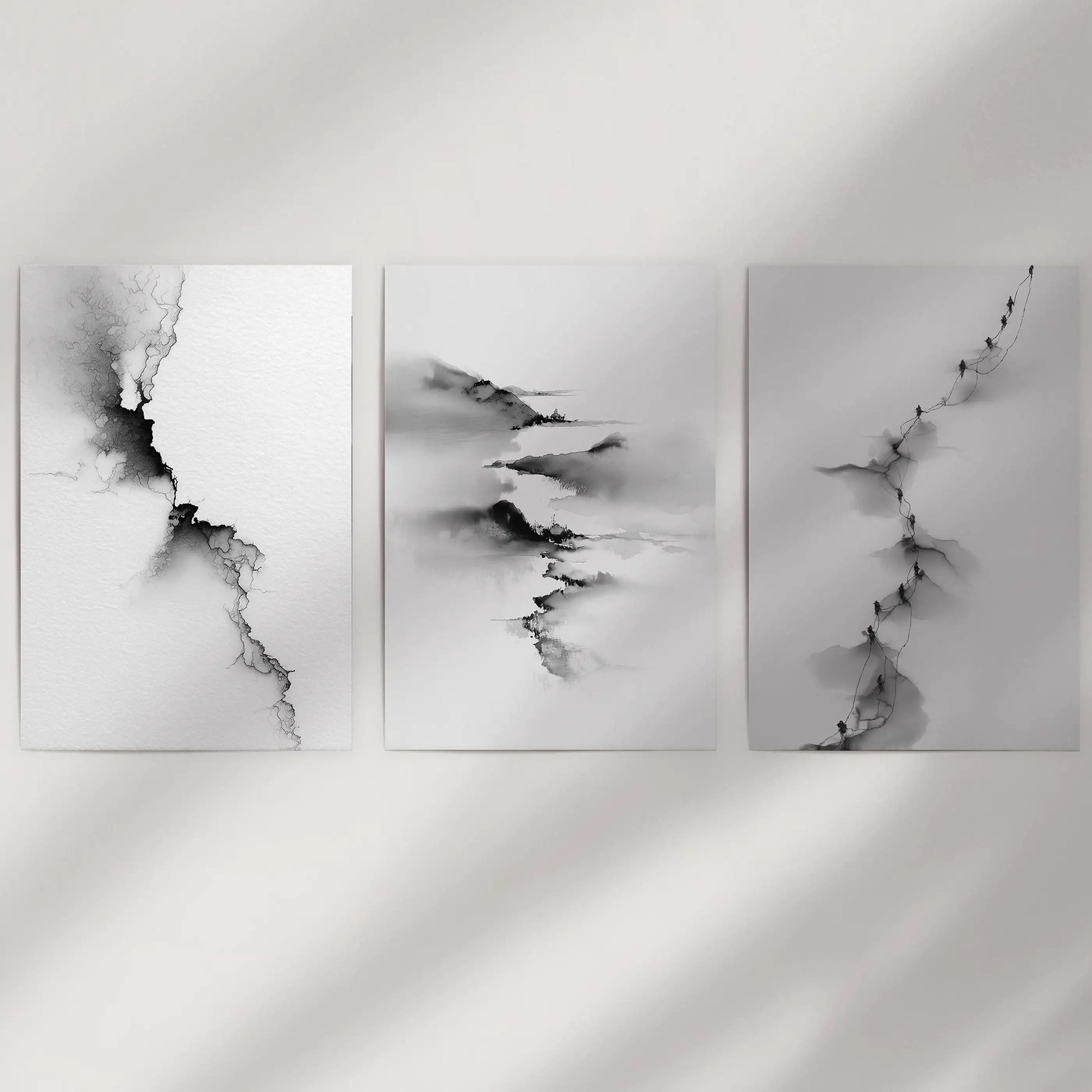 Calming scenic art triptych, a three-piece picture set of unframed prints, lends texture and depth to a bare wall space in monochrome.