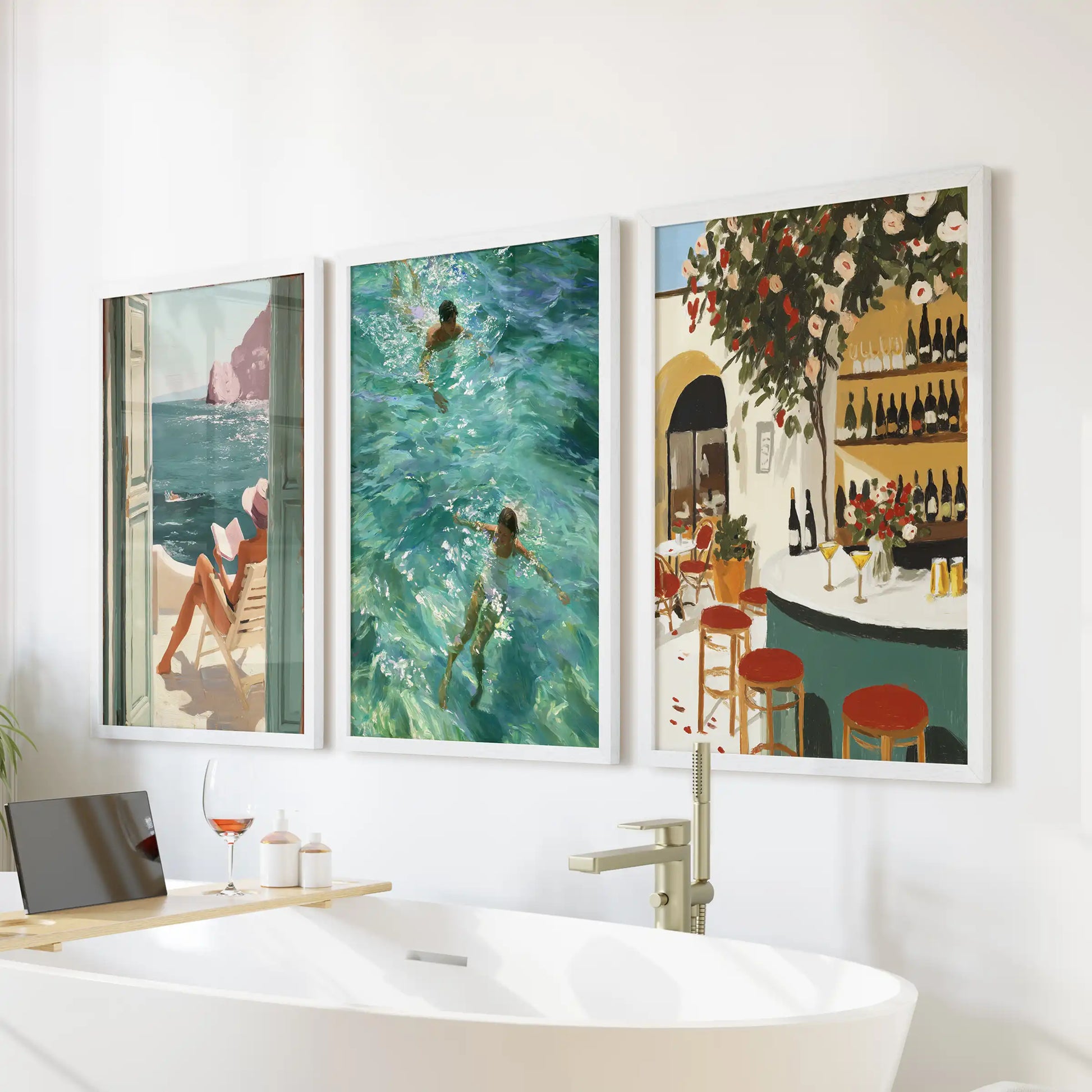 Riviera travel posters, a 3-piece framed wall art set in white, installed above the bath to bring crisp resort color to the bathroom.