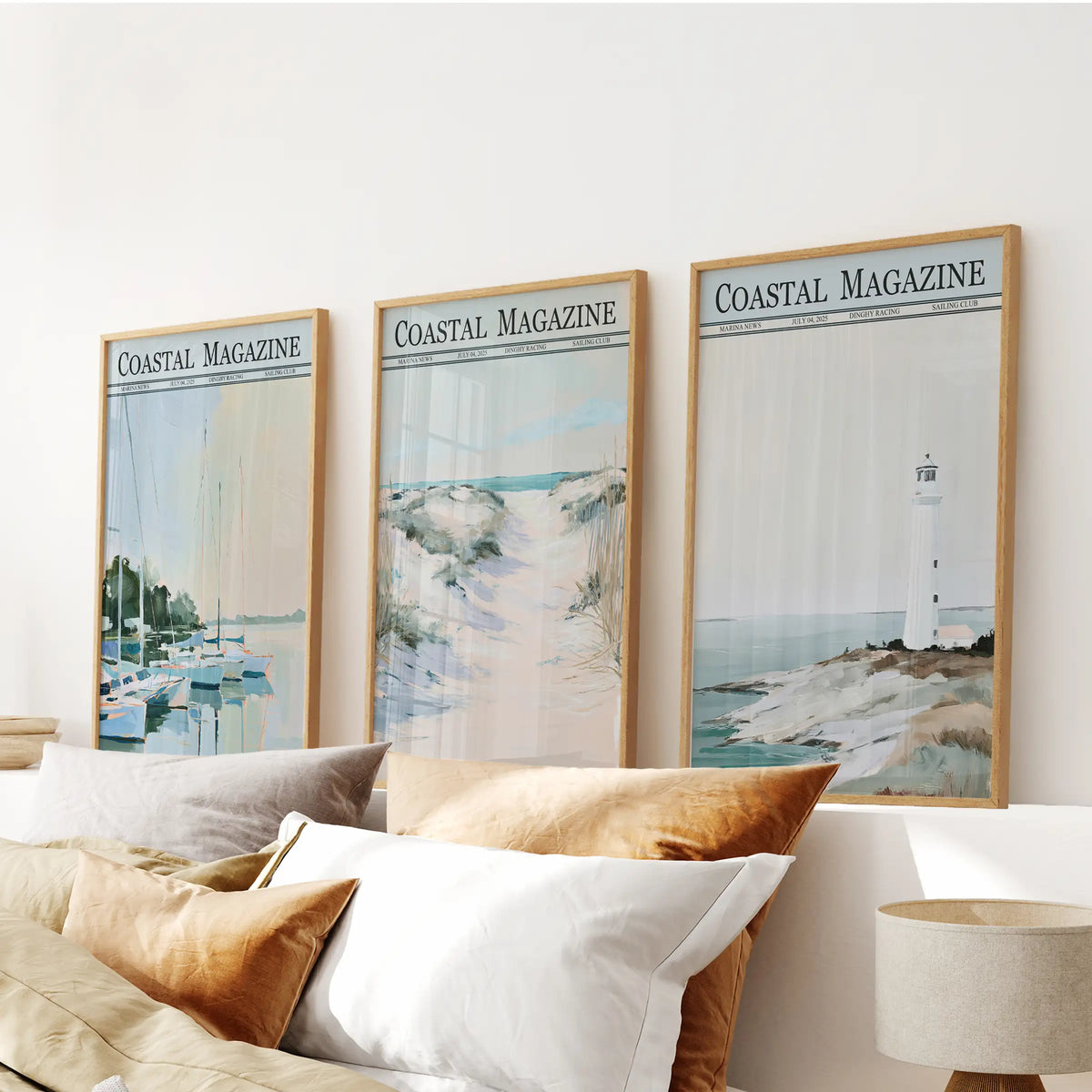 Seaside dunes three-piece wall art in light oak frames, arranged in a bedroom over the bed headboard.