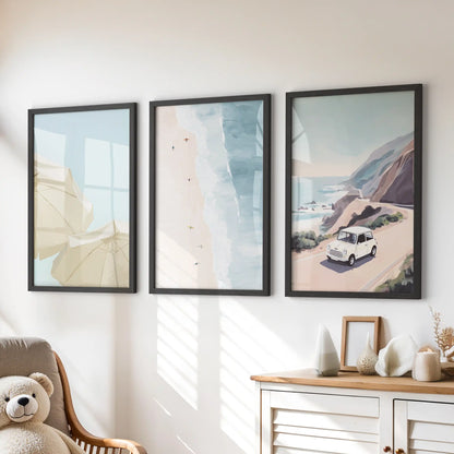 Pastel seaside landscapes wall decor, three-piece set in black frames, brings a calm splash to a children’s room above the chest of drawers.