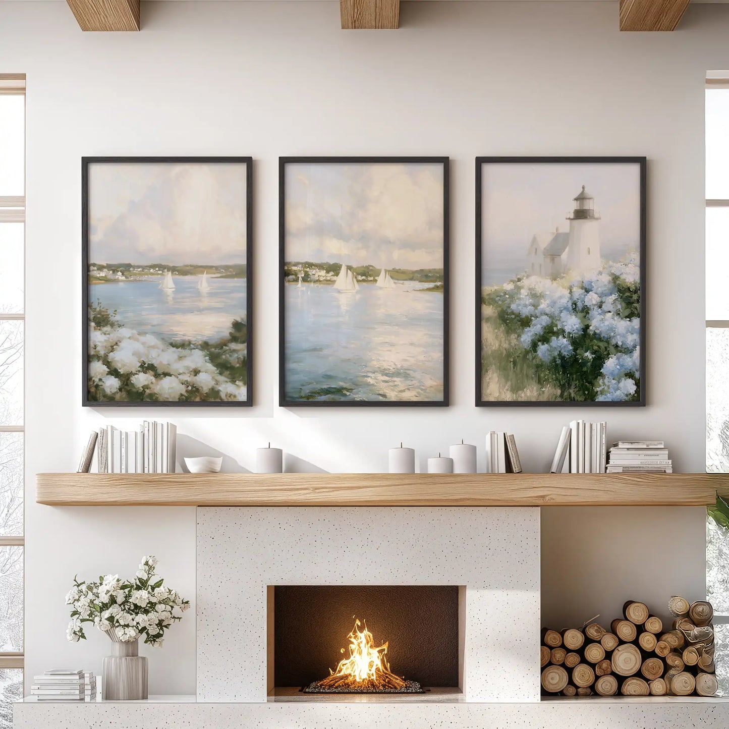 Wall art prints featuring Nantucket sailboats, offered as a set of three in black frames, add a breezy coastal accent above the sitting room mantel.