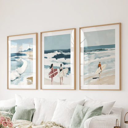 An oak-framed wall art trio showing ocean waves hangs over the sectional, infusing the lounge with smooth coastal calm.
