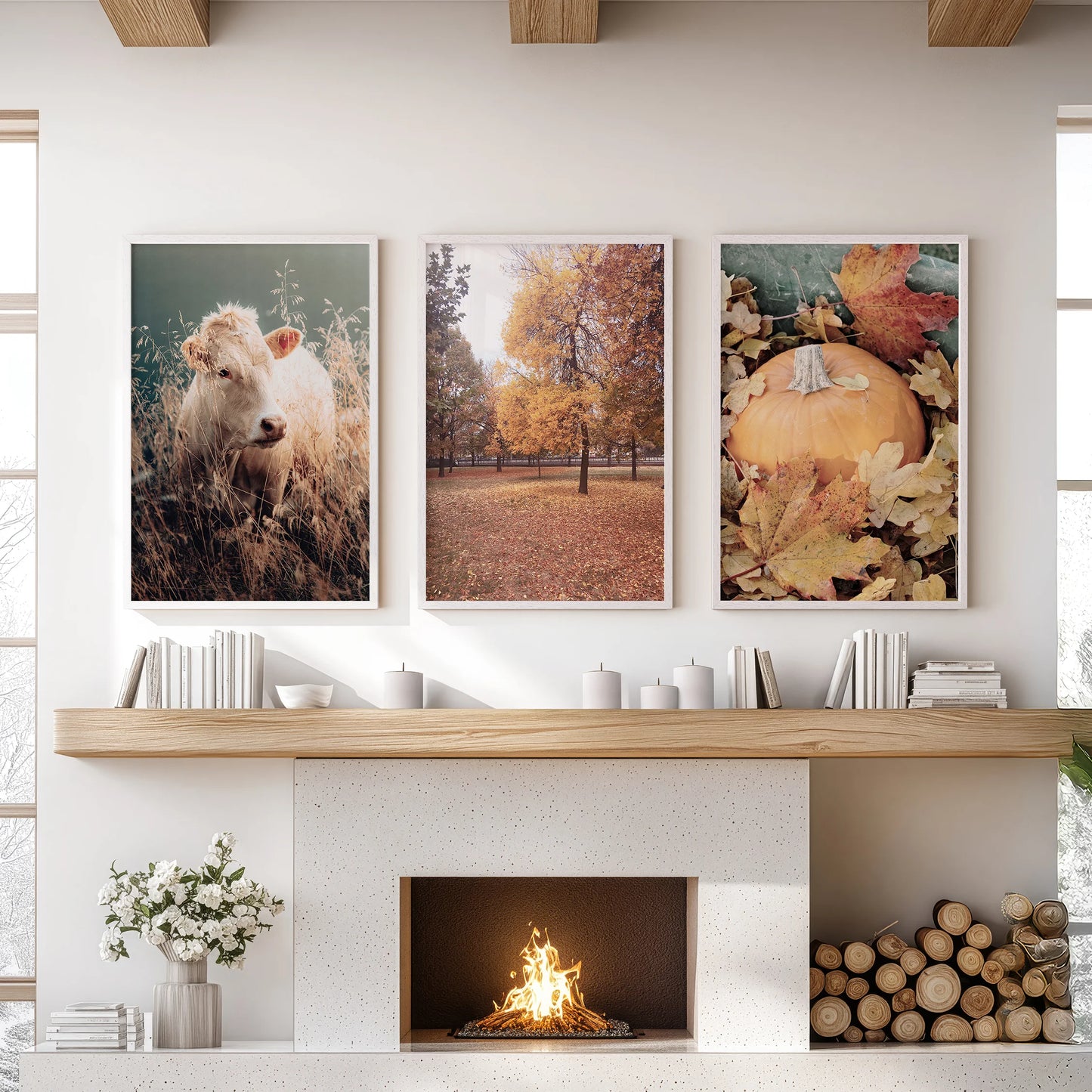 Three white-framed botanical prints anchor the space above the mantle, infusing the sitting room with autumn color.