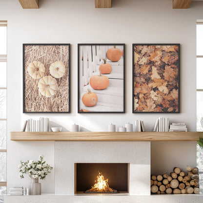 Pumpkin triptych wall art, three prints in black frames over the hearth in a family room, showcasing crisp fall harvest pumpkins in warm, farmhouse tones.