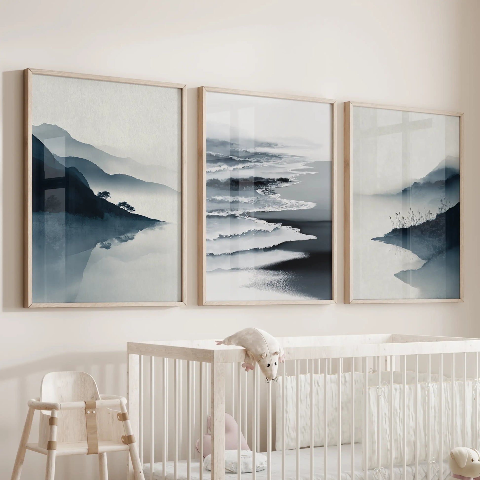 Coastal abstract waves wall art set of 3 floats over the bassinet in the nursery, trimmed in thin wood frames for an airy, modern touch.