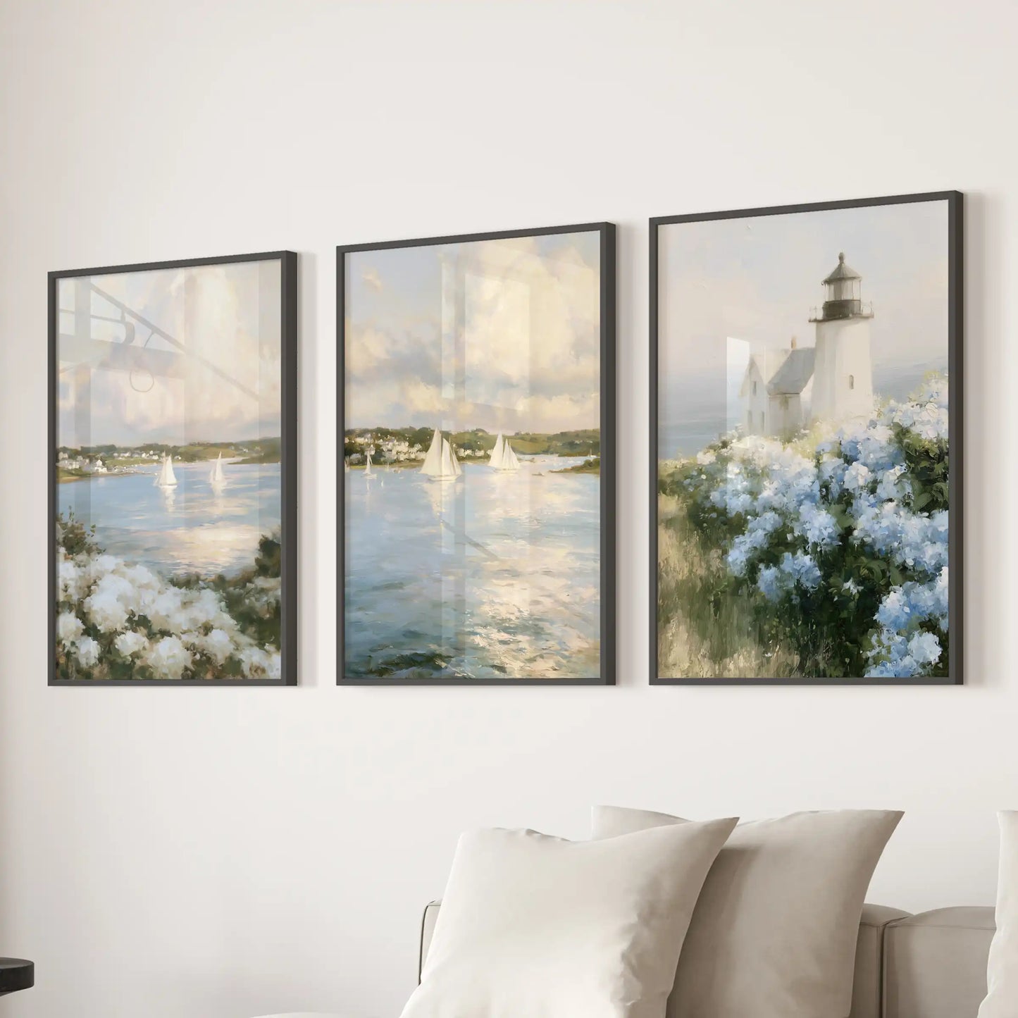 Vintage coastal seascape three-piece artwork, presented as black-framed prints, sets a relaxed mood in the lounge above the sectional sofa.