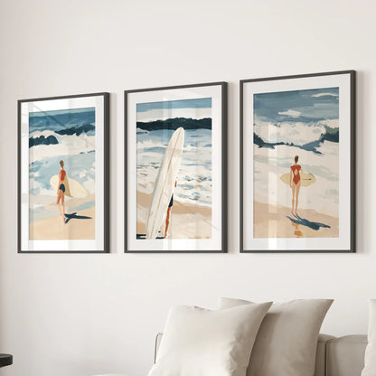 Surfer scenes, set of three prints in black frames with wide mats, float over the living room sofa to create a crisp coastal focal point.