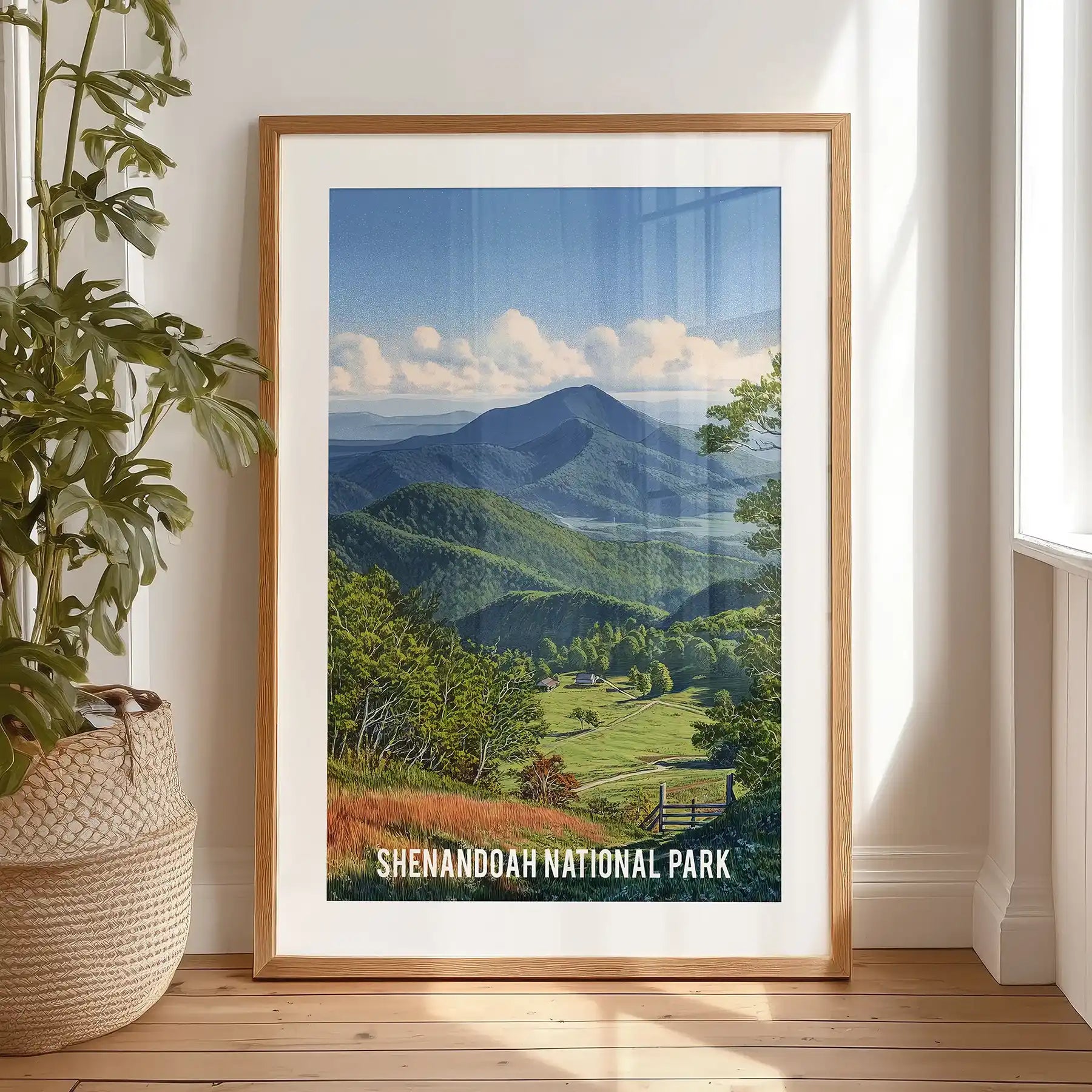 This Shenandoah National Park poster, matted and black-framed, is propped on the bedroom floor by the window, showing layered misty peaks.