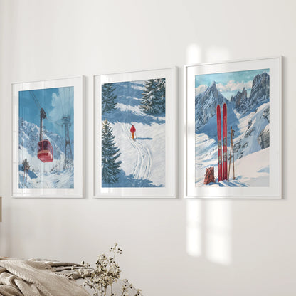 Retro skiing poster wall art, 3 pc set in white mat frames, accents a bedroom beside the bed with bold lines and a nostalgic palette.