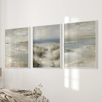 Serene ocean horizon 3-piece wall art, in crisp white frames, settles the bedroom wall with quiet coastal simplicity.