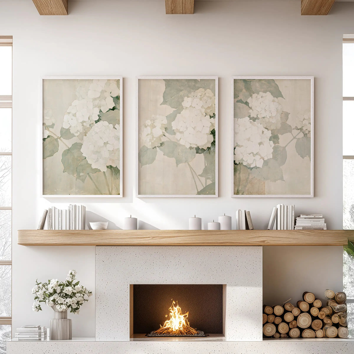 Set of three vintage botanical floral wall prints in white frames, displayed above the hearth in a family room.