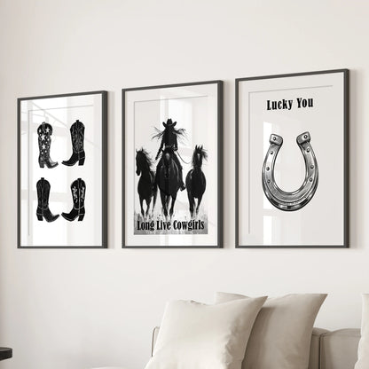 Monochrome Southwestern icons, displayed as a three-piece framed wall décor set with wide mats, balance neatly over the living-room sofa.