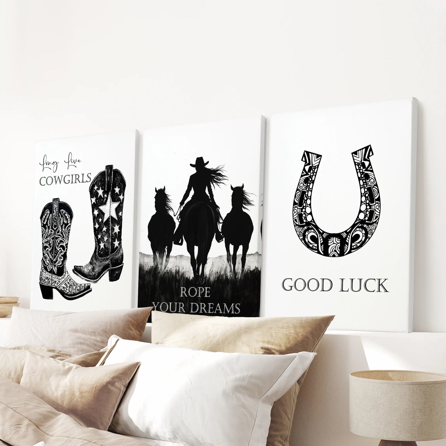 Ready-to-hang canvas posters-three in all-fill the space above the headboard, surrounding the bedroom with soft desert color and frontier ease.