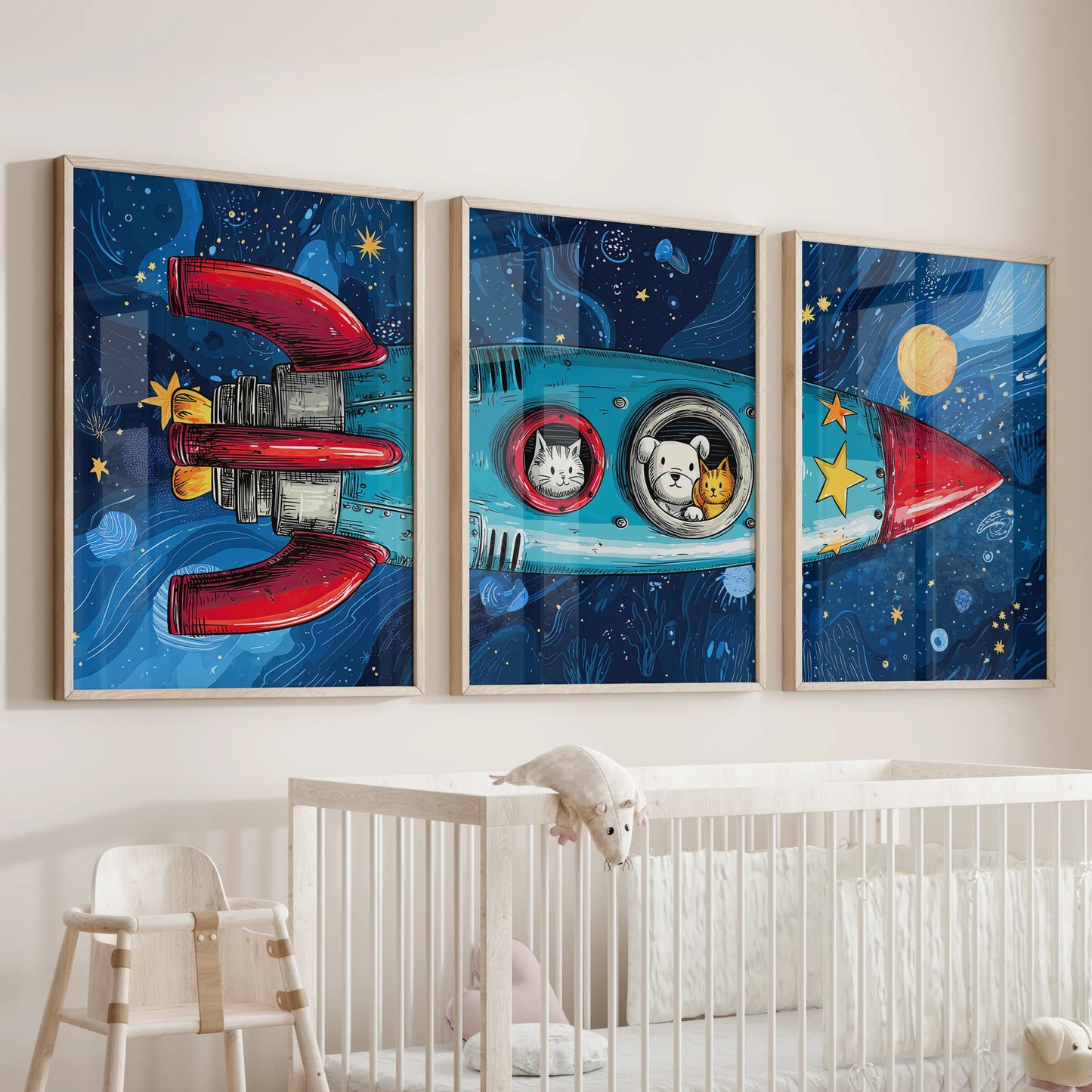Three small spaceship art prints framed in oak hover above the baby’s crib, adding gentle adventure to the nursery wall.