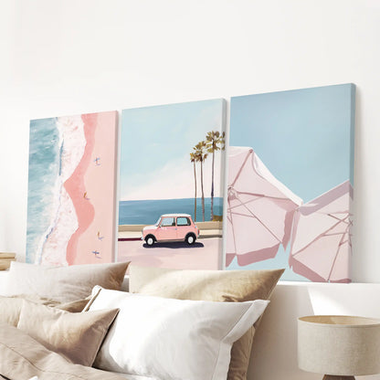 A set of three canvas prints with palm trees hangs over the headboard, giving the bedroom a fresh coastal lift.