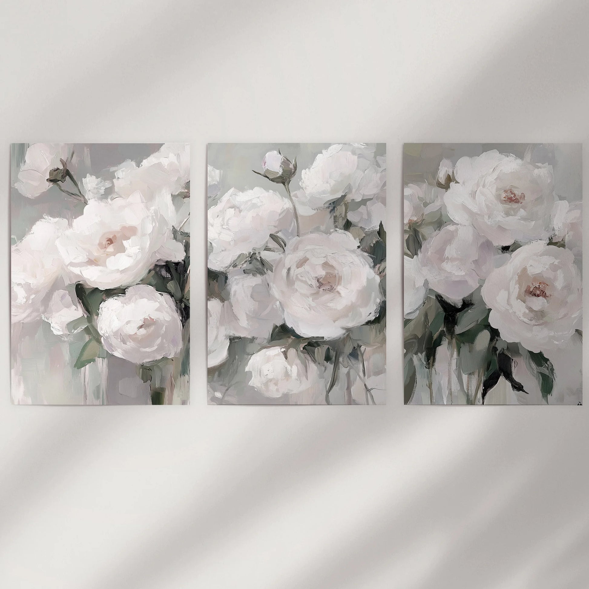 A 3-piece peony wall art set arrives unframed in a tube, ready to fill empty walls with layered botanicals and soft greens.